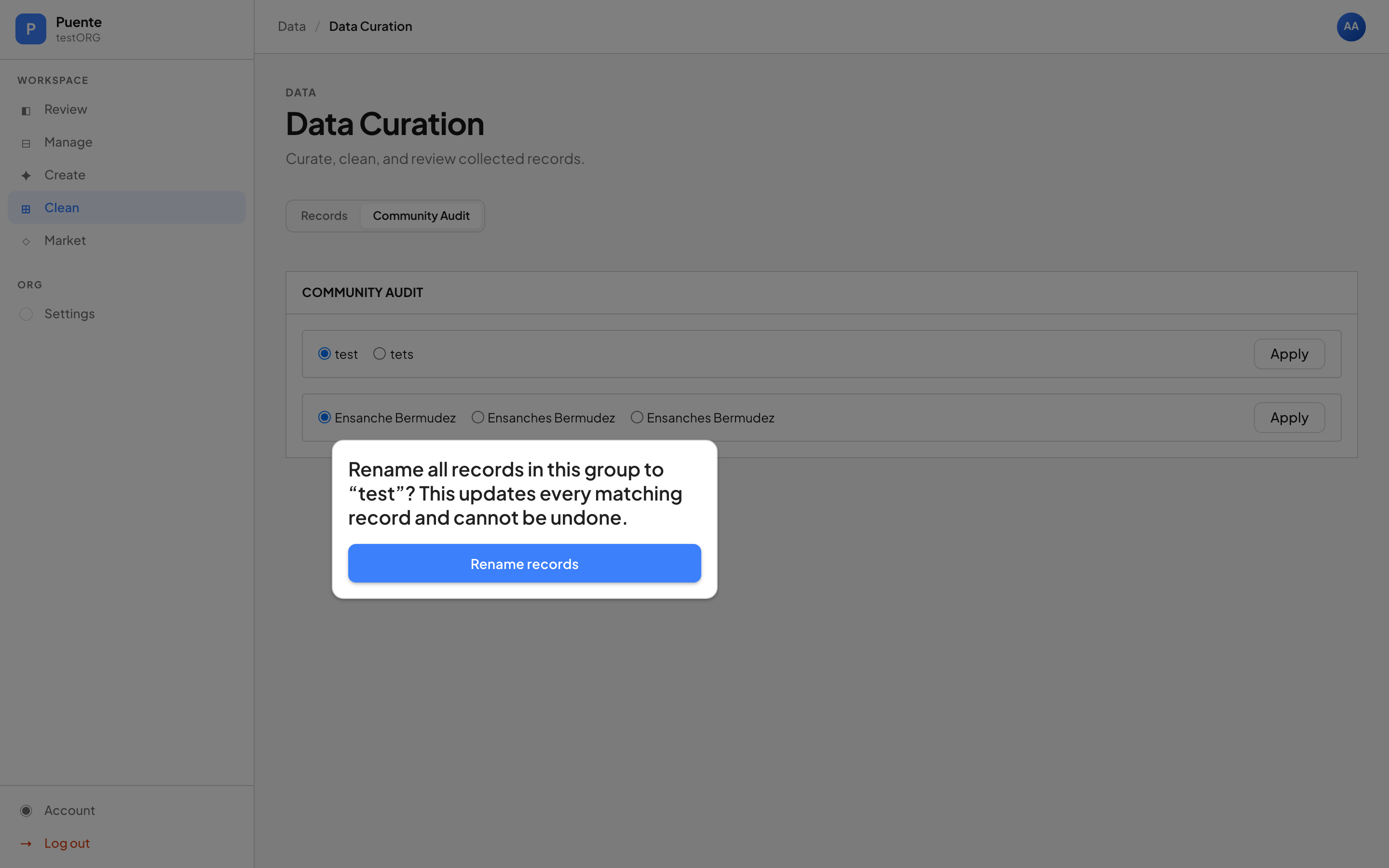 A confirmation modal reading "Rename all records in this group to 'test'? This updates every matching record and cannot be undone," over the Community Audit tab showing grouped near-duplicate spellings like "Ensanche Bermudez" / "Ensanches Bermudez" each with an Apply button